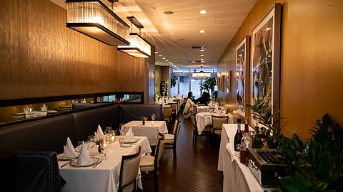 Candlelit dining room interior at Allora Ristorante on the Upper East Side