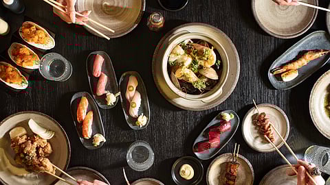 Assorted sushi, sashimi, skewers, and small plates at Double Knot Japanese restaurant in Miami