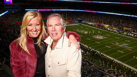Dr. Elena Alvarez-Westwood and Thomas J. Henry attend Super Bowl LX