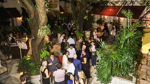 Guests mingle at Bouchon Bistro during the U.S. Construction brand campaign launch