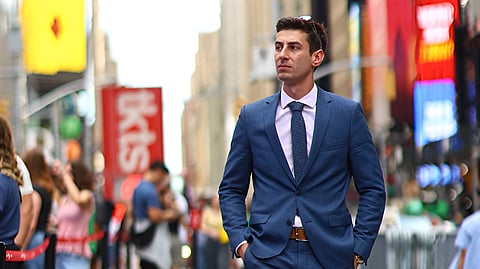Adrien Pieuchot, walking in Time Square, Manhattan
