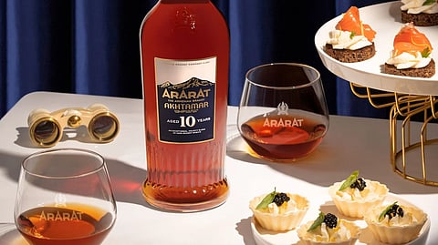 ARARAT Akhtamar 10 year Armenian brandy bottle with tasting glass and gourmet appetizers