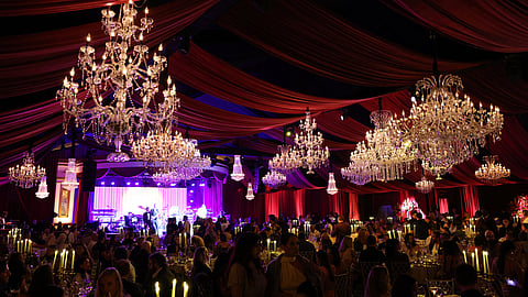 Elegant supper club with chandeliers, live band, and candlelit dining experience
