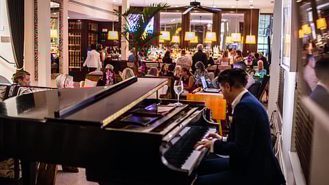 Pianist Leonard Reina performing at The Betsy Piano Bar