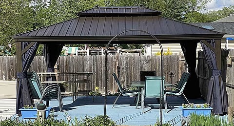 A backyard image with hardtop gazebo