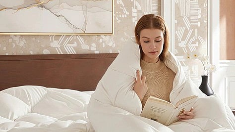 A white feathered comforter 