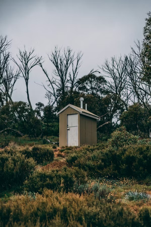 A rustic outdoor toilet