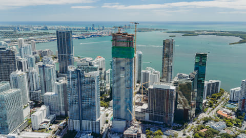 Aerial view of Cipriani Residences Miami under construction rising above Brickell skyline