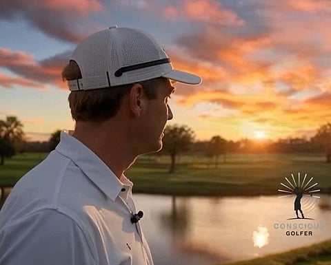 a white and navy Conscious Golfer apparel item