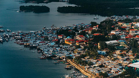 Aerial view of waterfront homes and coastal property in the Philippines