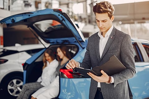 a scene in a car showroom