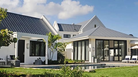 Modern luxury Caribbean villa with pool and tropical landscaping