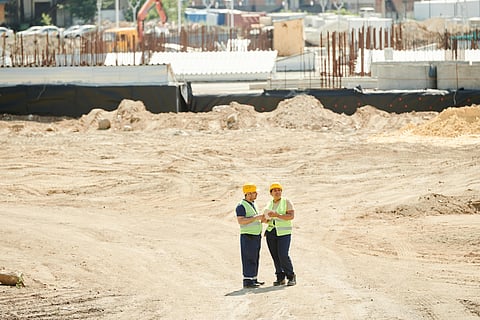 two civil engineers on a site