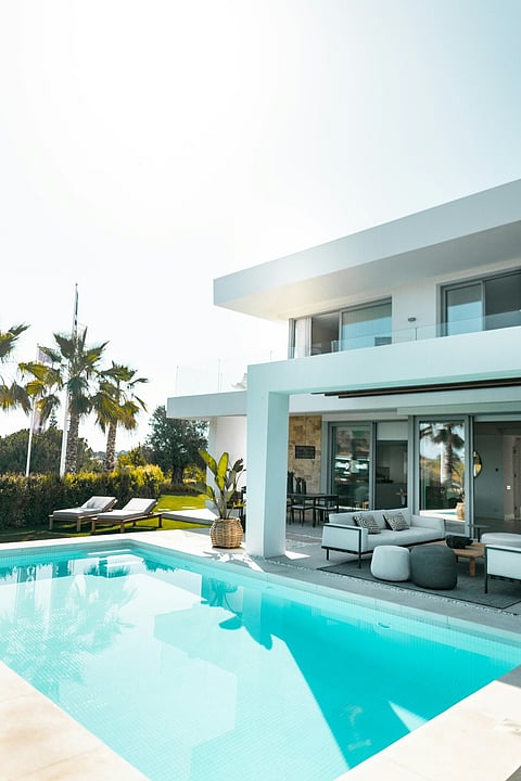 a luxury home with swimming pool