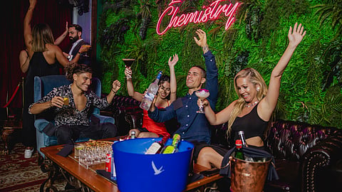 Guests enjoy cocktails during Copper 29 Bar's 10th anniversary celebration