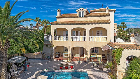 a luxury home with a swimming pool