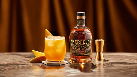 Mango Daydream cocktail with Aberfeldy 12, mango garnish, and ice