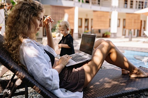 a girl using laptop