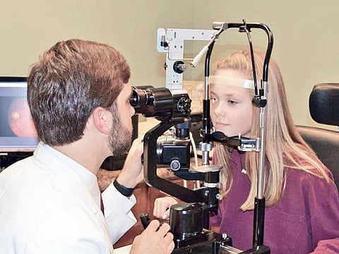 a patient undergoing a comprehensive eye examination
