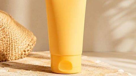 sunscreen bottle in yellow