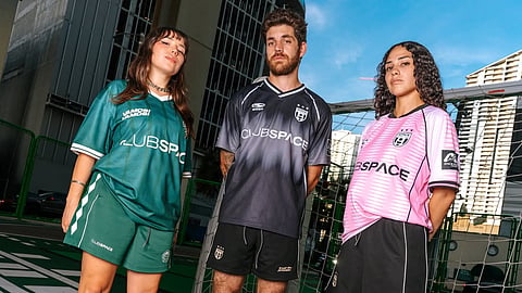 Club Space models showcase the Space Futbol Club collection on a Miami futsal court
