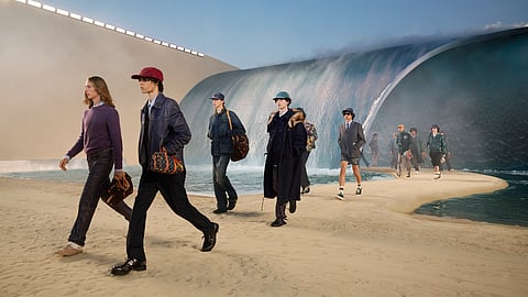 Louis Vuitton SS27 runway finale with models crossing the wave-inspired set