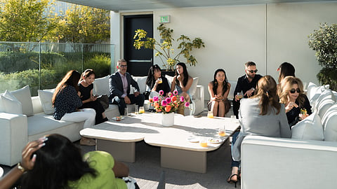Guests mingle at the Mandarin Oriental Beverly Hills rooftop broker event