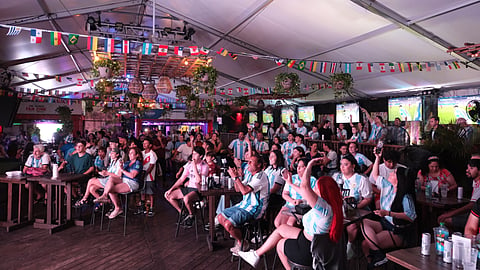 Crowds watch a World Cup match at Wynwood Marketplace's open-air viewing event