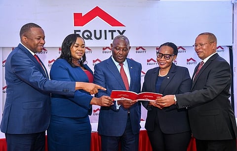Business executives attending a corporate event and reviewing a document together