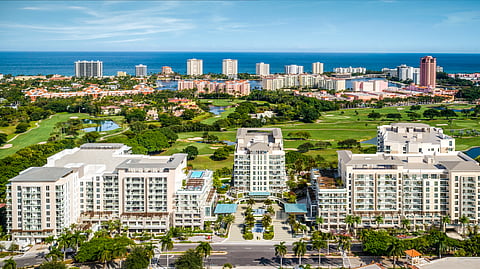 Aerial view of ALINA Residences Boca Raton beside the golf course and coastline