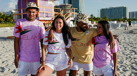 Models wear Delano x The Paradise Suite football jerseys on South Beach during World Cup season