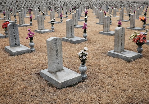 Rows of gray stone graves