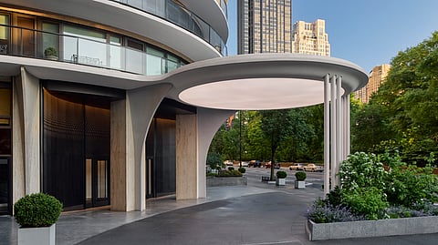 200 Central Park South entrance with ODA's new bronze façade and circular marquee