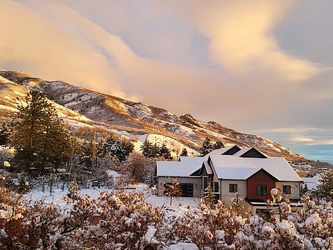 Snowy mountain and house.