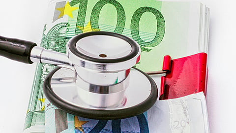 Stethoscope on Euro bills.