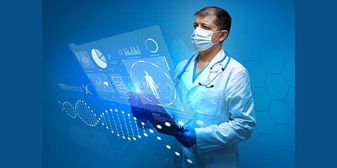 Doctor viewing holographic medical data.