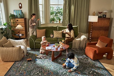 Family relaxing in a living room.