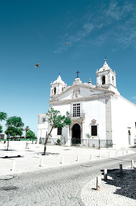 White church with two bell towers.
