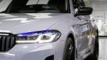 Front of a silver car.