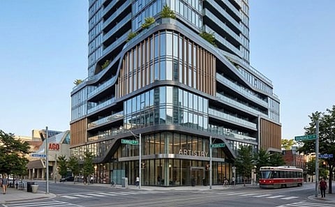 Modern glass high-rise building on a street corner.