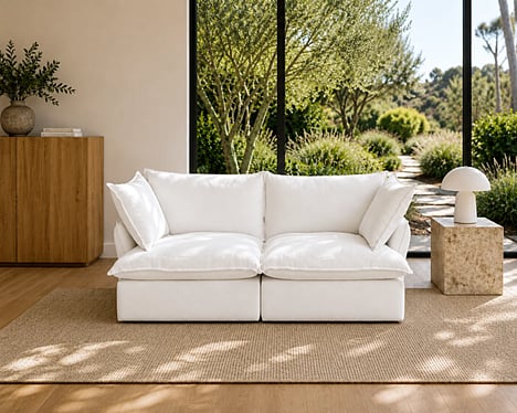 White sofa by a large window