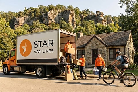 Movers unloading a Star Van Lines truck.