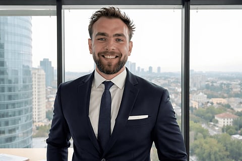Smiling businessman in a suit.