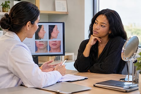 Doctor consulting a patient.