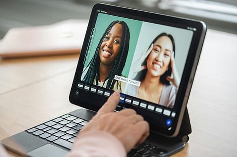 Hand editing a video on a tablet