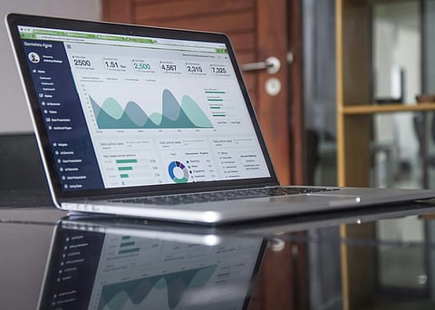 Laptop displaying a data dashboard.