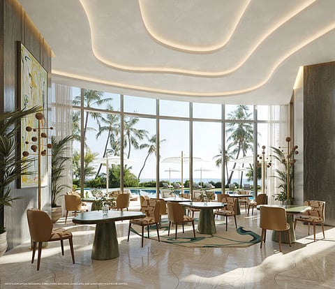 Rendering of a sunlit dining room with round tables and tall windows facing palms and the ocean