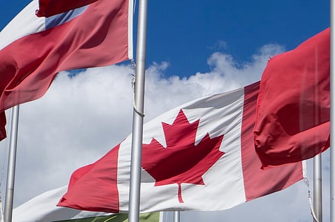 Canadian flags waving.