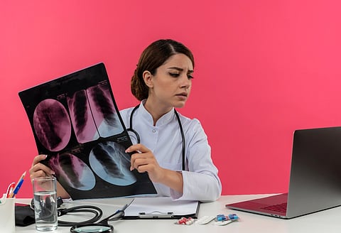 Doctor reviewing an X-ray.