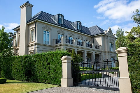 Large two-story mansion.   